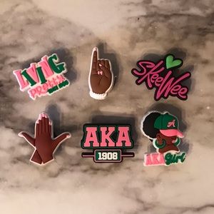 Brand new pink and green AKA croc charms set of 6